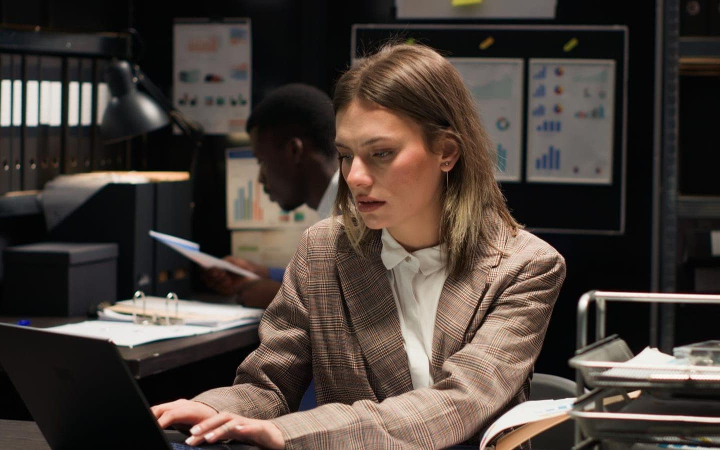 Woman working on example AI policy